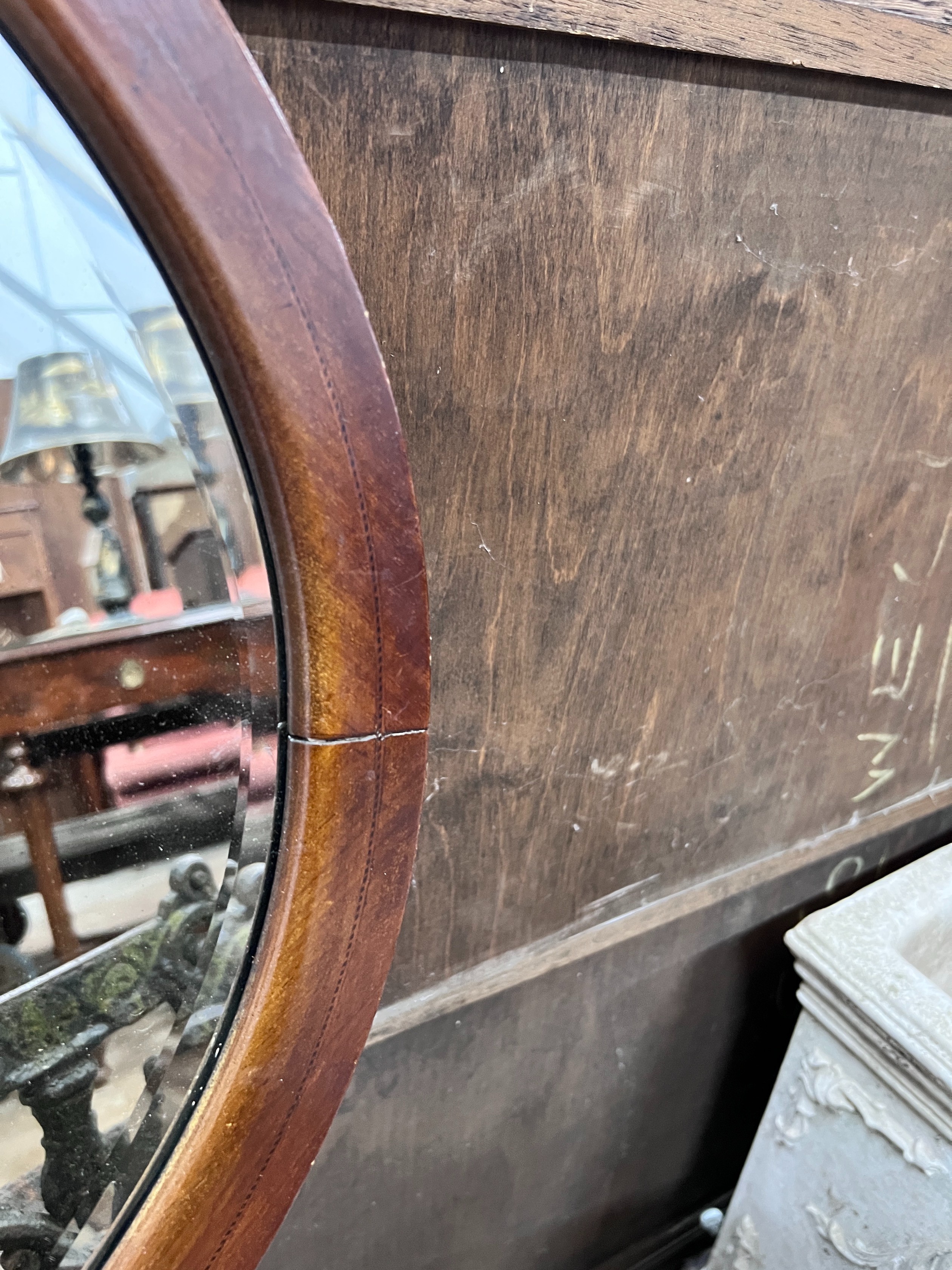 An Edwardian strung mahogany wall mirror, width 90cm, height 65cm *Please note the sale commences at 9am.